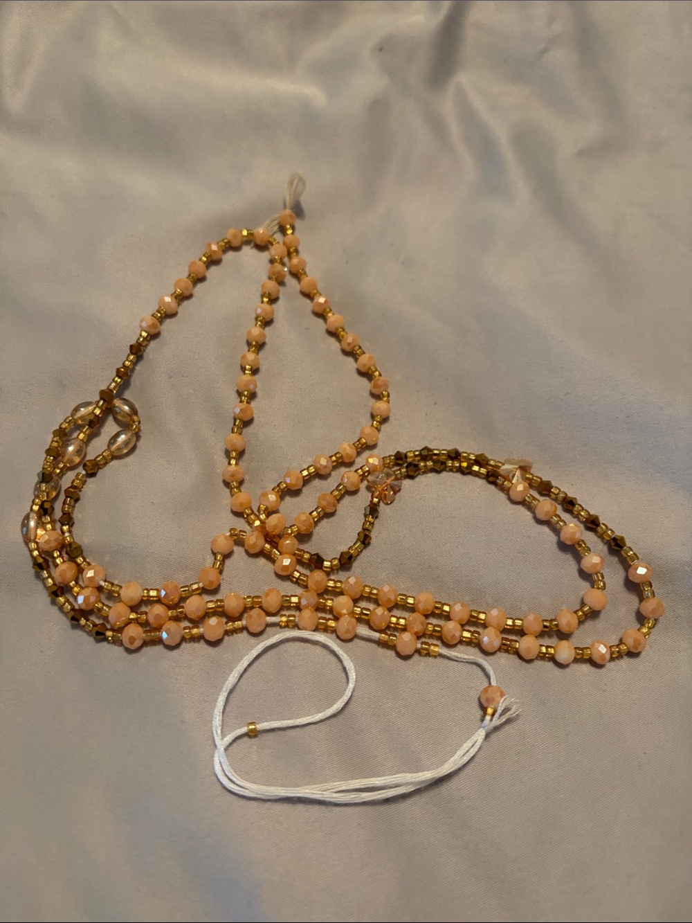 Handmade Peach and Gold Beaded Women’s waist beads from Ghana